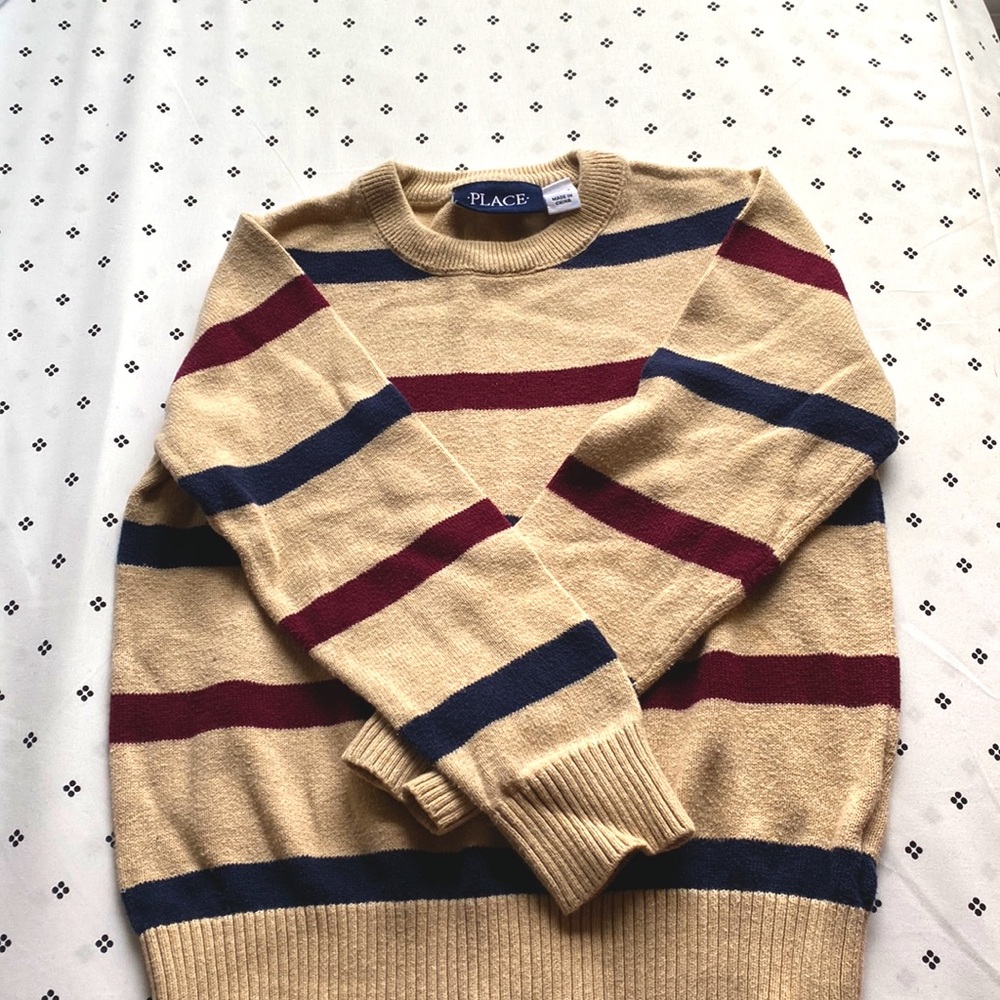 It’s a kids boy sweater. From childrens place and only used once